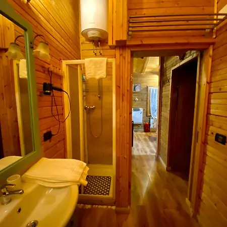 Casa Nel Bosco Chalé *